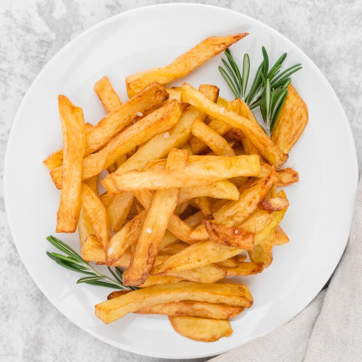 top-view-plate-with-delicious-french-fries