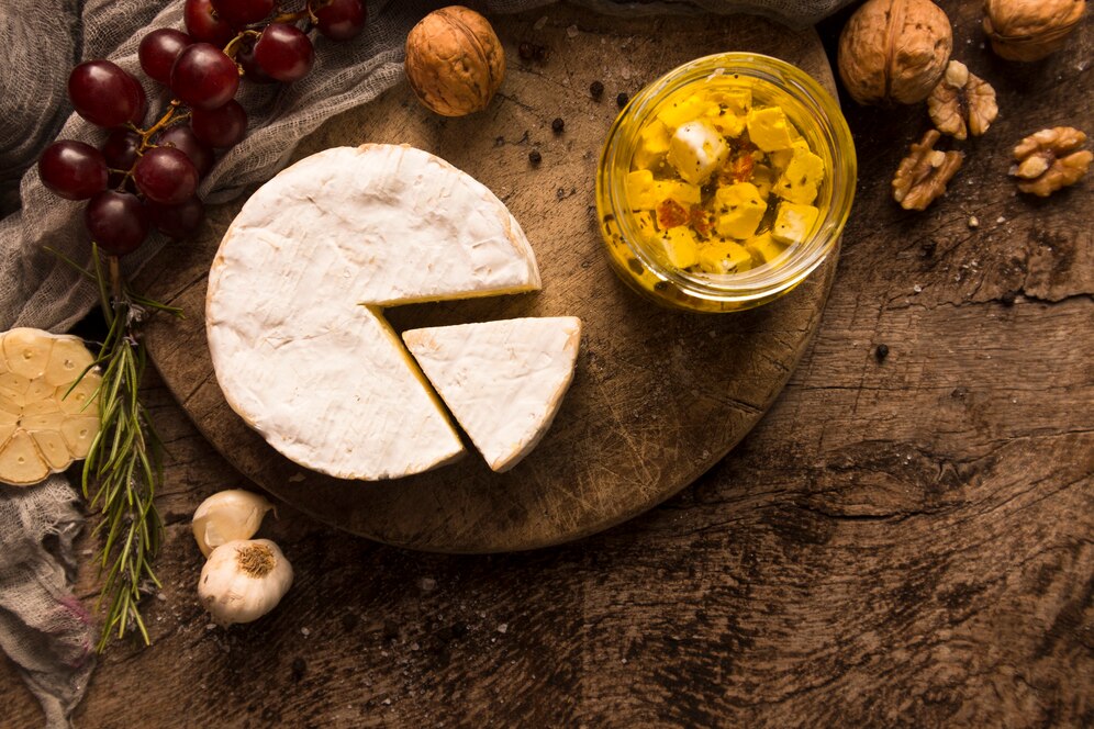 composition-different-delicacies-wooden-table